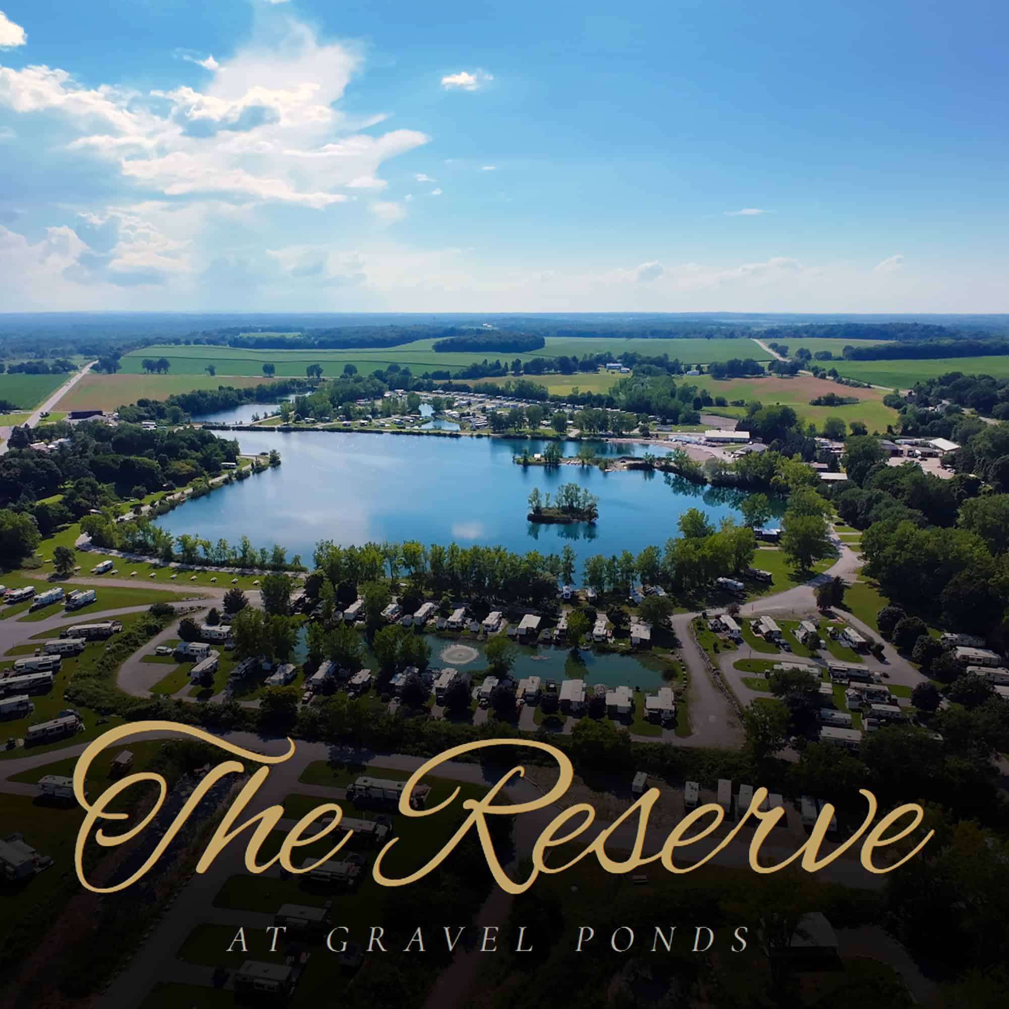 Aerial view of Gravel Ponds with The Reserve at Gravel Ponds logo